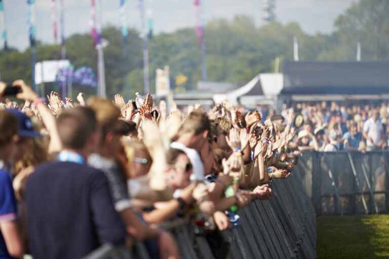 Crowds Enjoying Themselves At Outdoor Music Festival